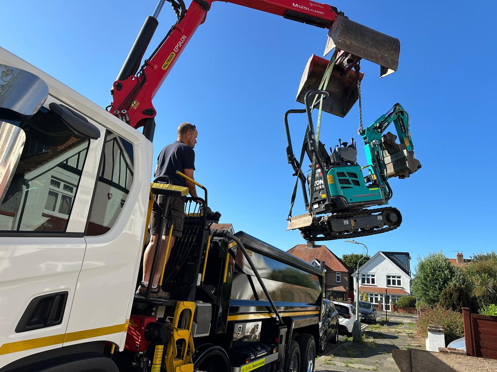 Ady operating the grab crane on site